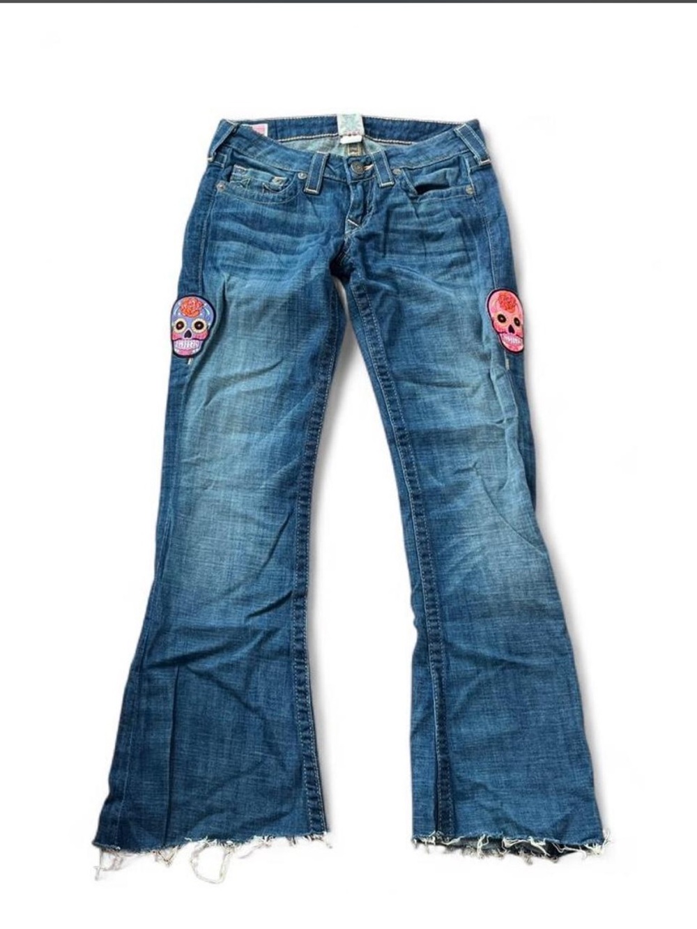 True Religion Blue Flared Jeans with Pink Skull Patches